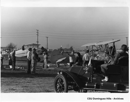 Gathering of old cars and planes