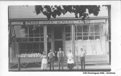 Evans Bros. General Store storefront with staff