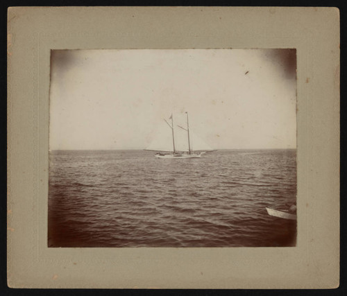 Two-masted sailboat on ocean