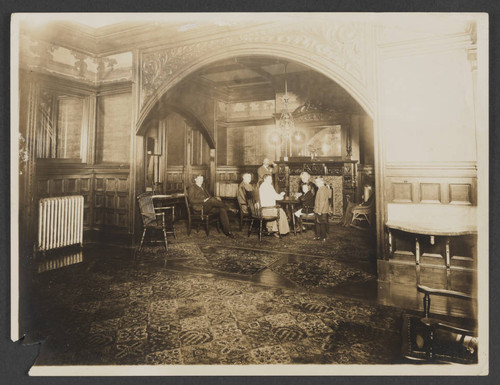 People playing cards in Hotel Redondo