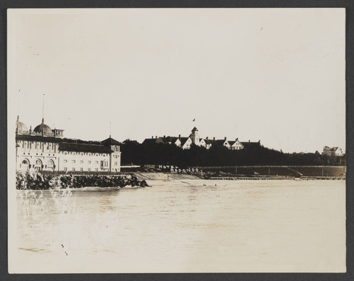 Hotel Redondo behind a body of water