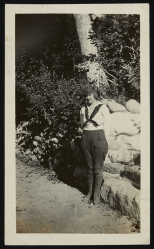 Woman standing by stairs