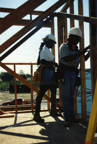 Carpenters at a Habitat for Humanity construction site
