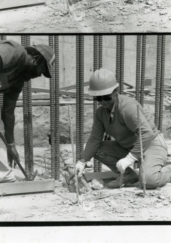 Laborers at a Century Freeway construction site