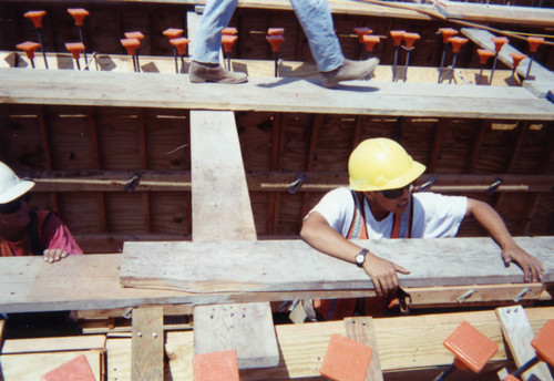 A carpenter at a construction site