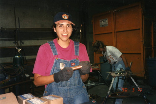 Plumber in a workshop