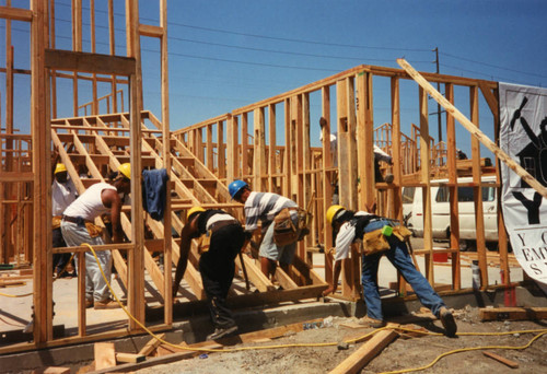 Trainees at a Youth Employment Systems site