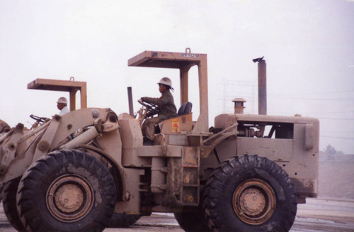 Heavy equipment operator at a construction site