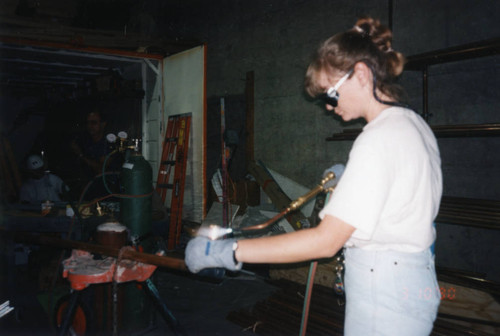 Plumber in a workroom