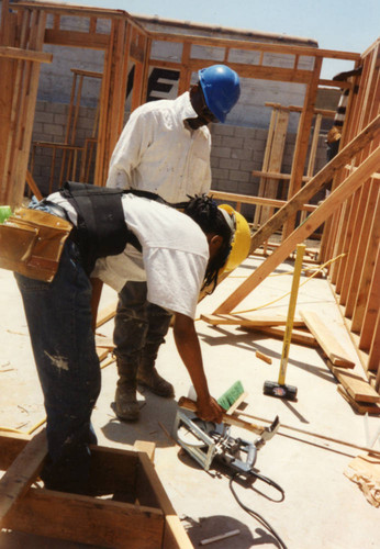 Trainees at a Youth Employment Systems site