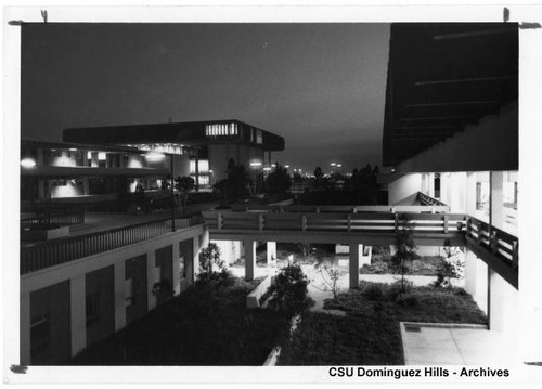 Lighted campus buildings at night