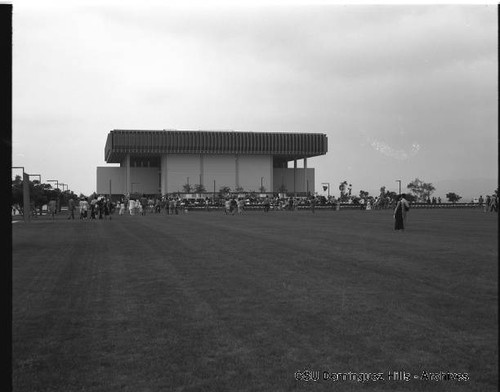 Audience gathering for graduation assembly