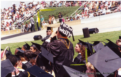 Graduate with joke mortarboard