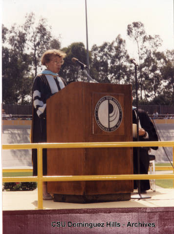 Claudia Hampton speaking at graduation