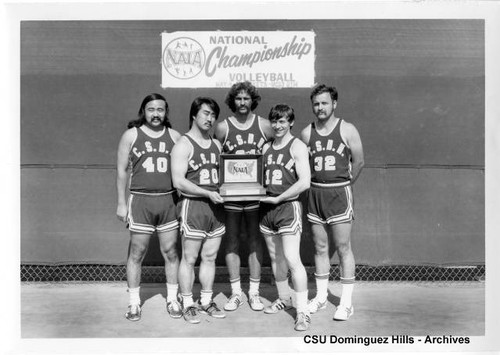 1973 Men's Volleyball starters with trophy