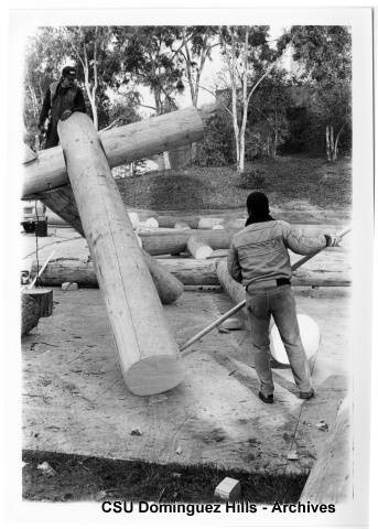 Workers installing Falkenstein sculpture