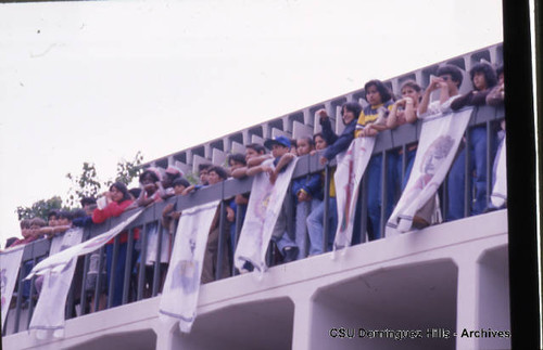 Elementary Students leaning on ERC Balcony