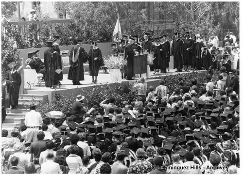 Graduates receiving diplomas