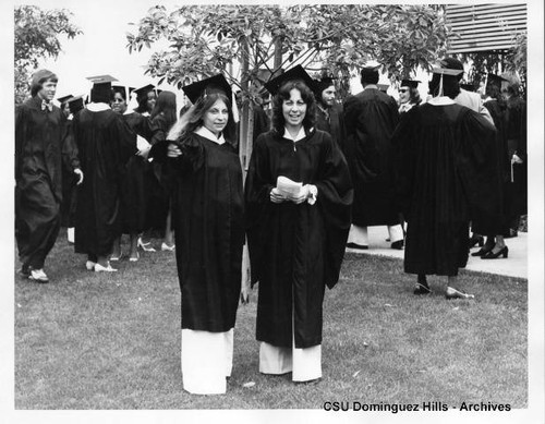 Masslers pose during commencement