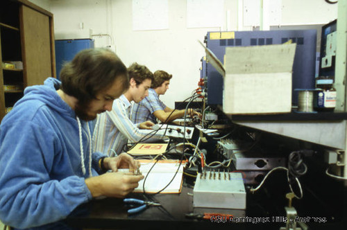 Biology students with technological equipment