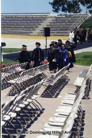 Professors enter graduation seating area