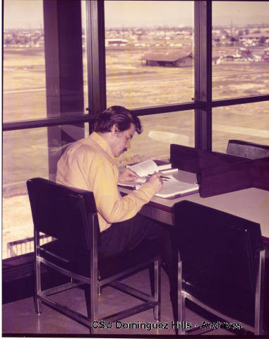 Student studying in library