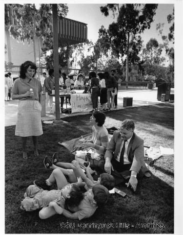 Family on ground during Homecoming Week