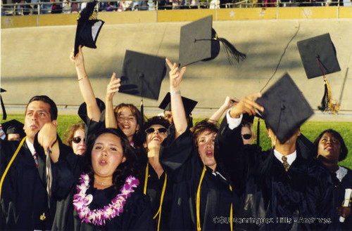 Graduates celebrate after graduation ceremonies