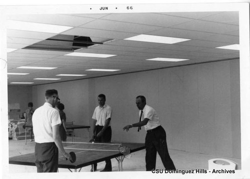 Students, faculty playing table tennis