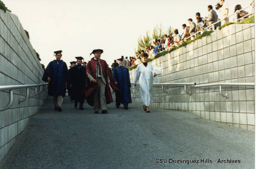 Faculty Marshals leading processional into Velodrome