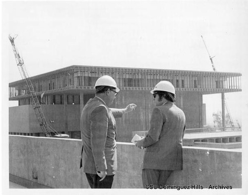 President Cain at library construction site