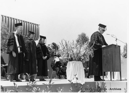 President Cain presents teaching awards at 1976 commencement