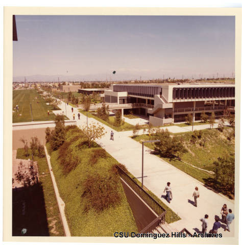 Social and Behavioral Sciences Building and campus sidewalk