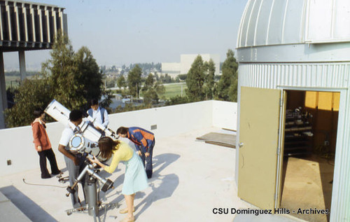 Astronomy class with telescopes