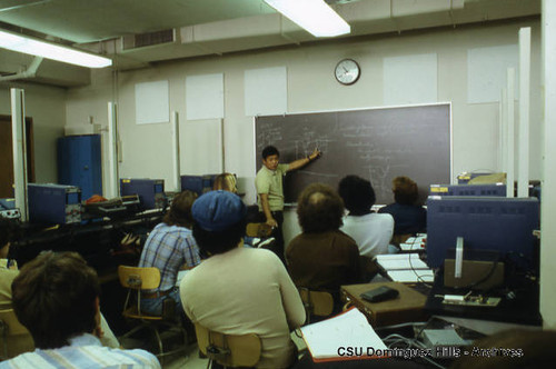 Jim Imai leads class