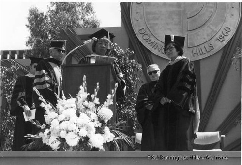 Dr. Lois Chi receiving award at 1979 graduation