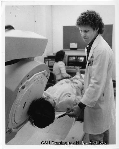 Nursing student with patient