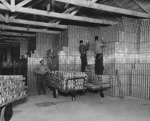 1946 Empty tins at cannery warehouse