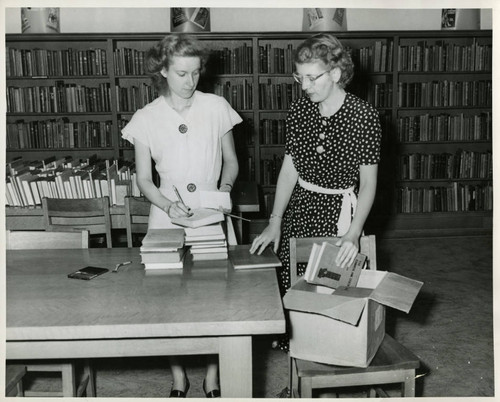 1952, Old Post Office, Two library staff processing books