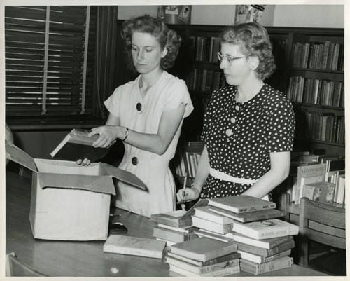 1952, Old Post Office, Two library staff processing books