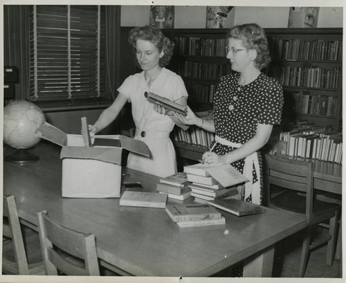 1952, Old Post Office, Two library staff processing books