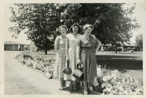 1943, Three Library Staff Pose on a Pathway