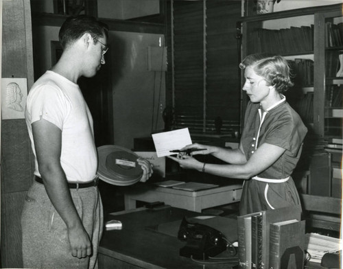 1951, Old Post Office building, Peggy McDaniel and patron