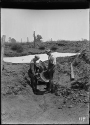 Bringing sloth pelvis from pit. (RLB-179)