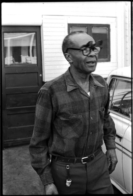 Jesse Fuller in front of his home in West Oakland