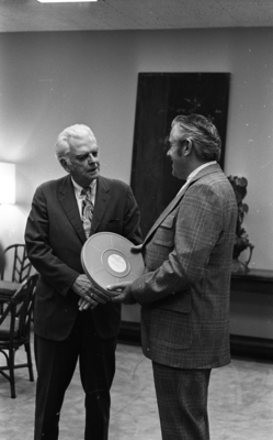 KPIX general manager Al Constant (left) and former museum director John Peetz speaking at Jesse Fuller concert at the Oakland Museum