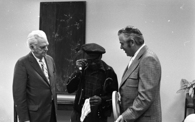 Blues musician Jesse Fuller speaking with KPIX general manager Al Constant (left) and former museum director John Peetz during concert at the Oakland Museum