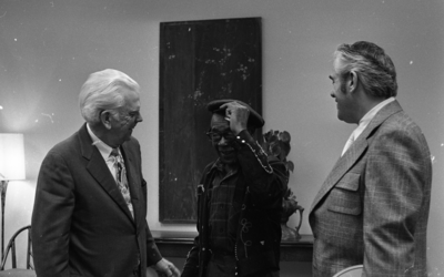 Blues musician Jesse Fuller speaking with KPIX general manager Al Constant (left) and former museum director John Peetz during concert at the Oakland Museum