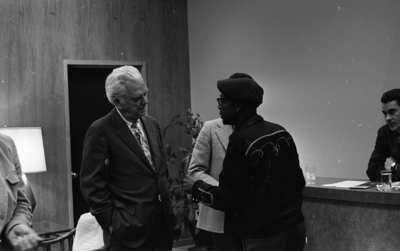 KPIX general manager Al Constant (left) speaking with blues musician Jesse Fuller after concert at the Oakland Museum