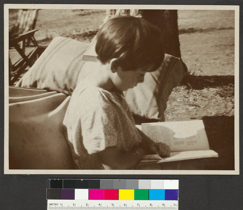 Ursula Kroeber Le Guin reading a book